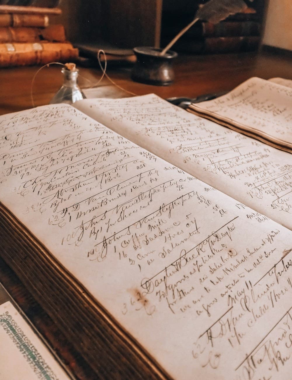 A handwritten account ledger — the manual bookkeeping Ferbz replaces